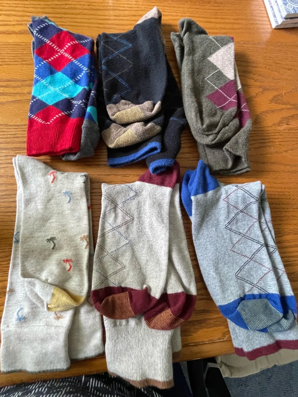 Six pairs socks, including some argyle & one tropical pattern
